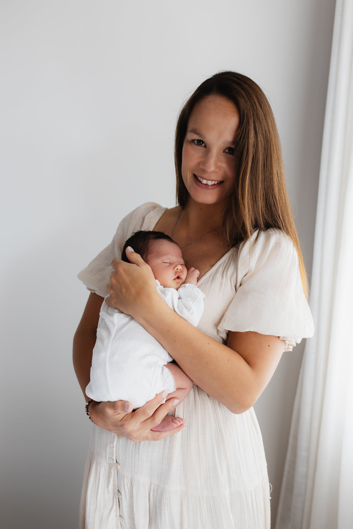 Newbornshoot van mama en baby