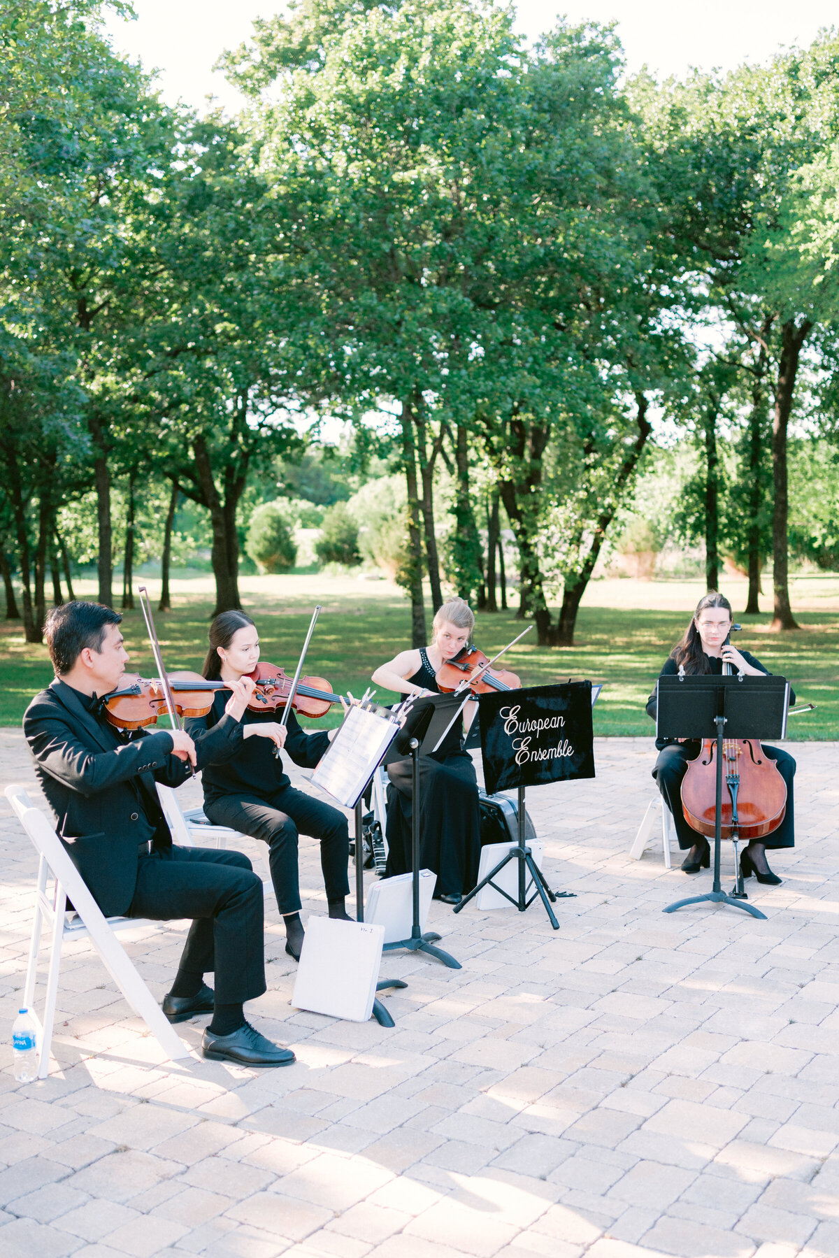 String quartet playing at luxury wedding at The Olana, Dallas