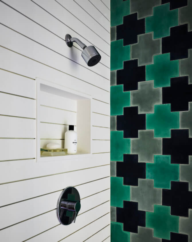 Hingham interior designers use custom Popham tile walls and shiplap for a new construction home’s pool house, blending modern design with timeless materials.