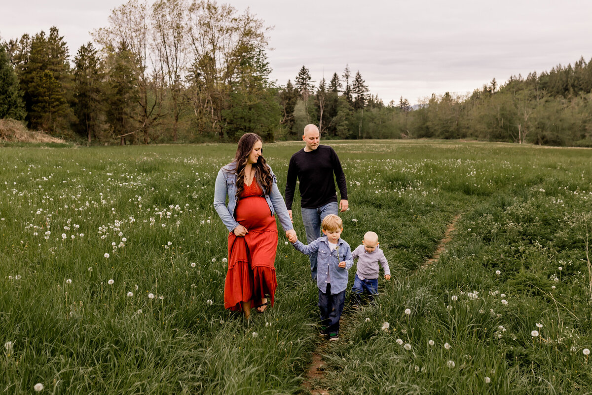 family of 4 walking the trail