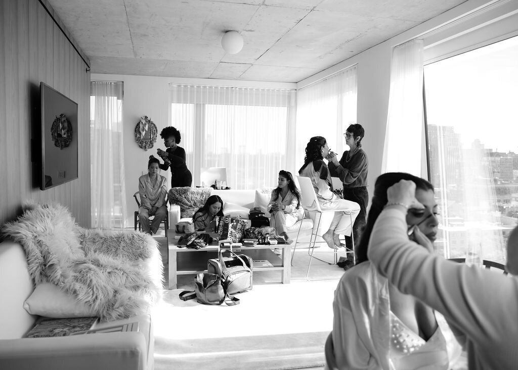 Wedding party in hair and makeup in a suite at Public Hotel in Manhattan, NYC