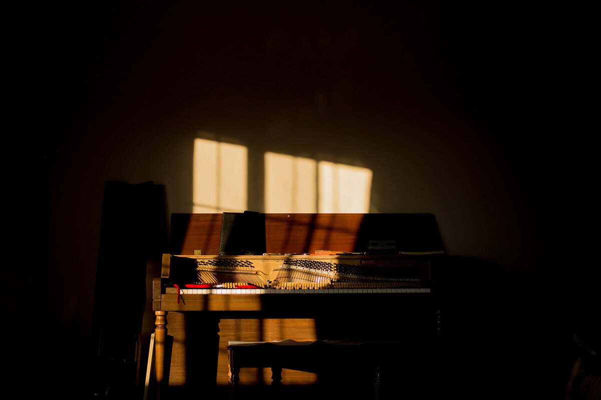 light shining during piano tuning