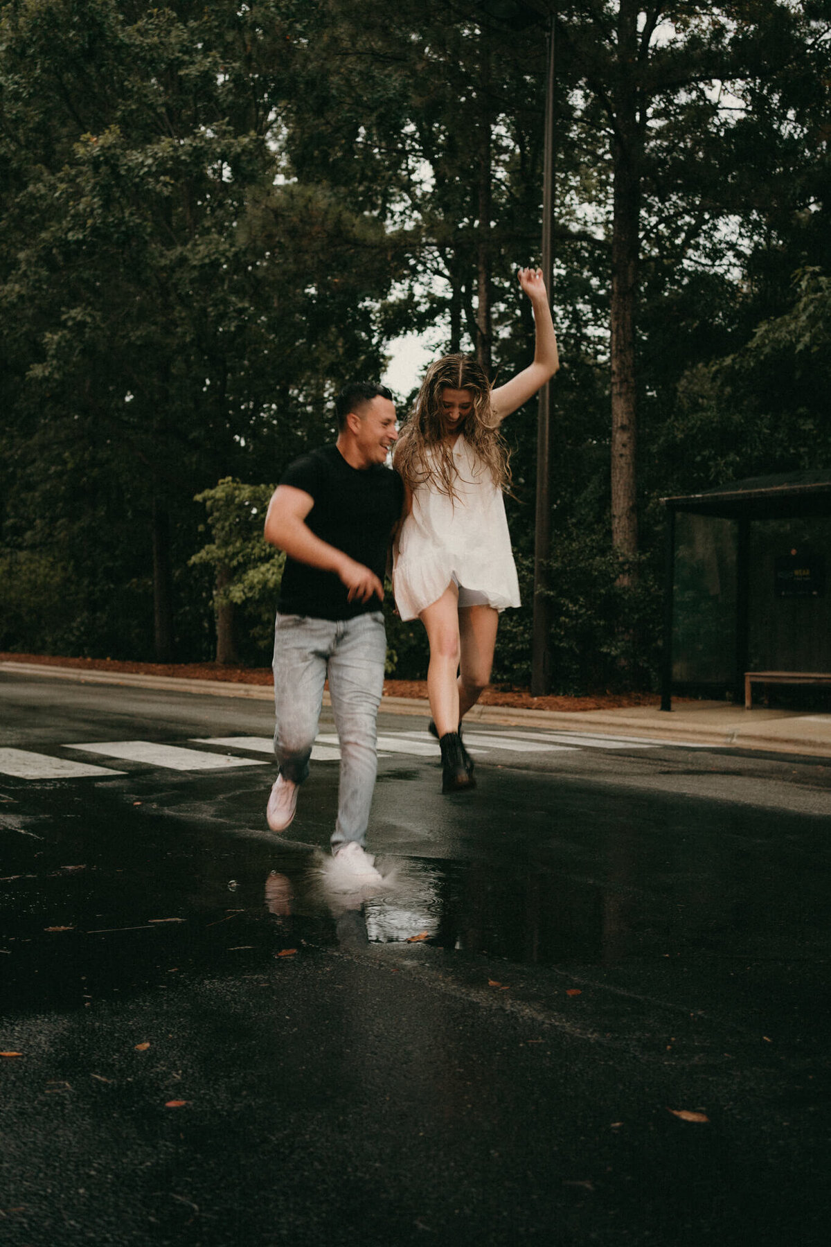 couple playing in the rain