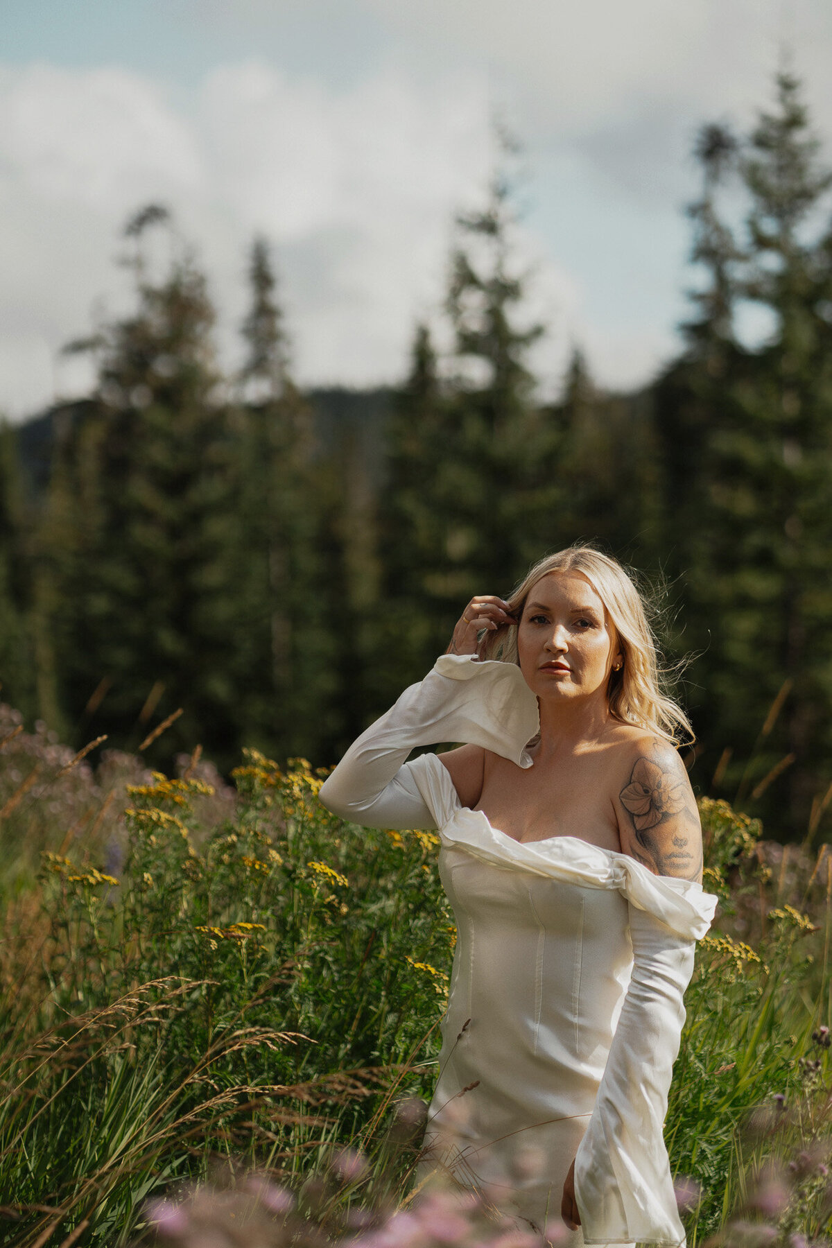 Bride during her mount washington alpine resort elopement by latitude 49 photography