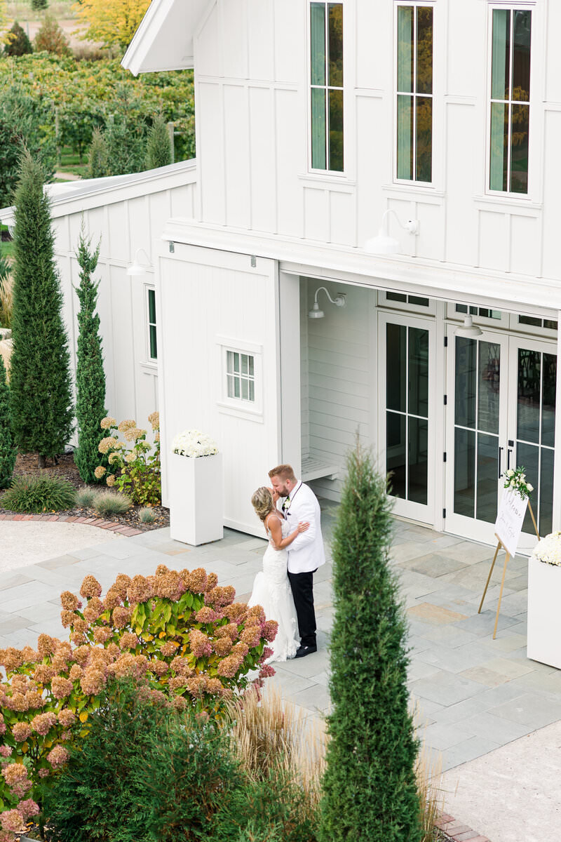 wedding couple kissing by wedding photography minneapolis