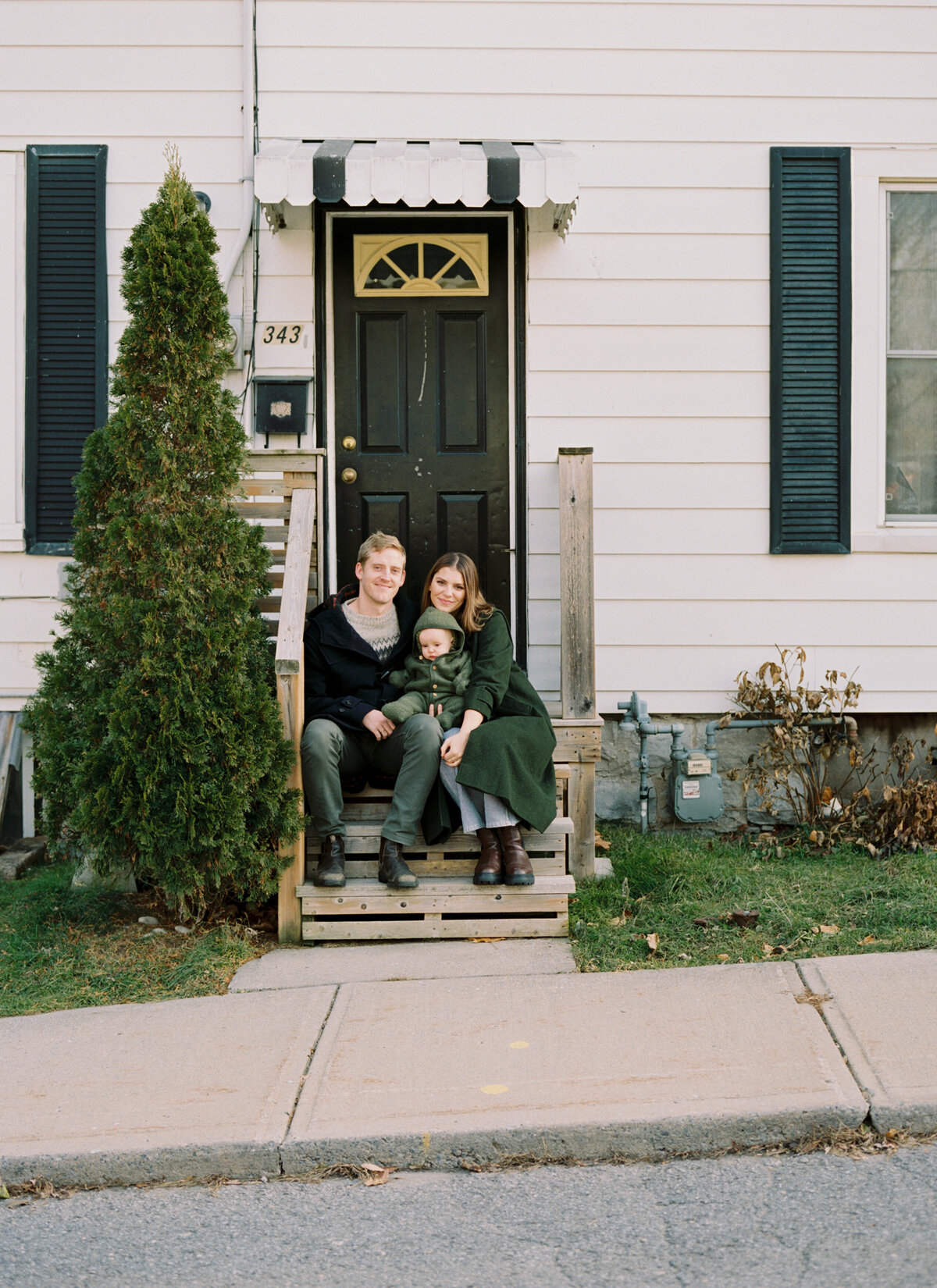 front-step-candid-family-portrait