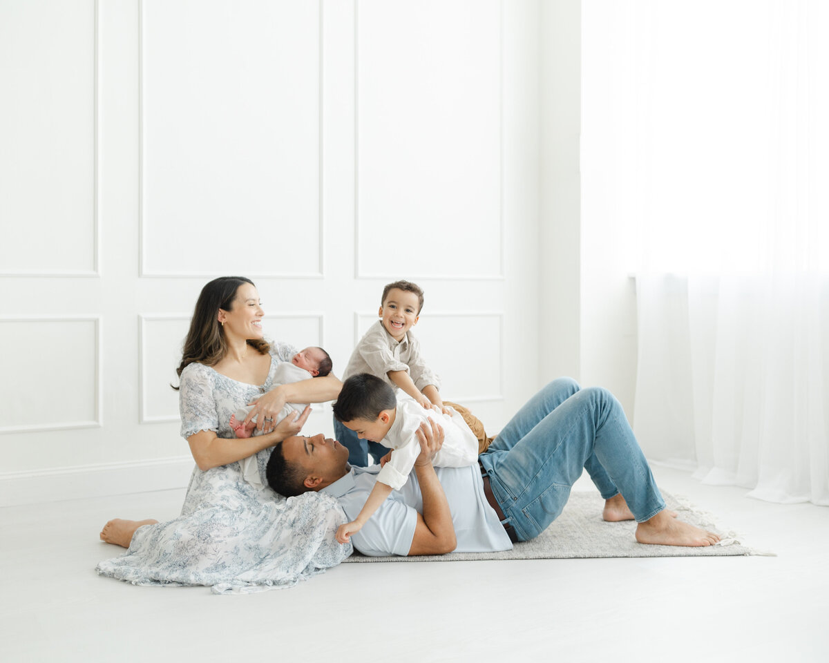 Newborn photography session with siblings at a Philadelphia photography studio - 17