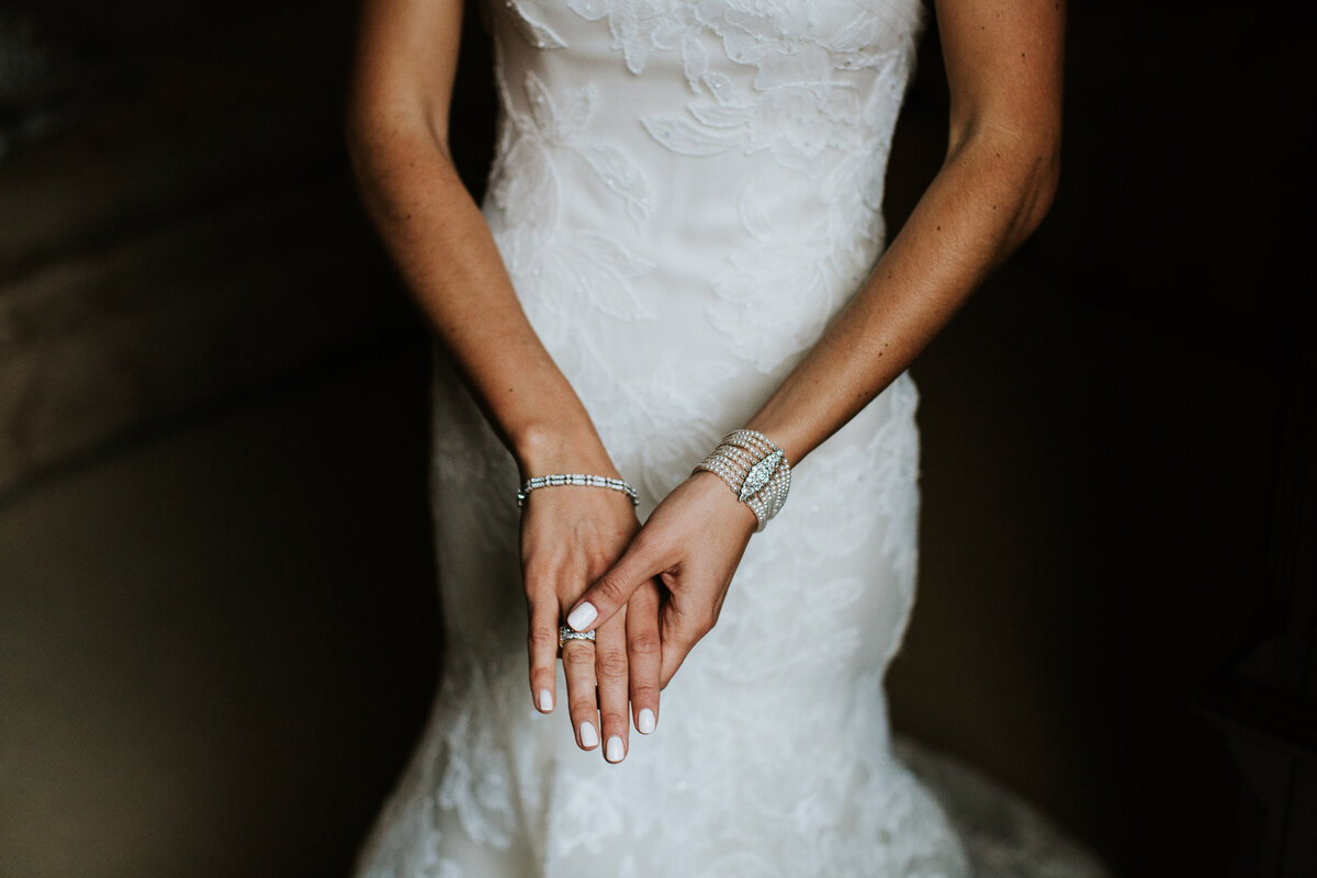 Bridal jewelry on bride before wedding ceremony