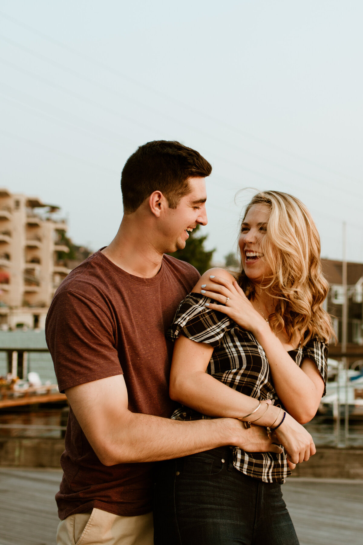 A candid and playful engagement session at sunset captured by Fort Worth Wedding Photographer, Megan Christine Studio