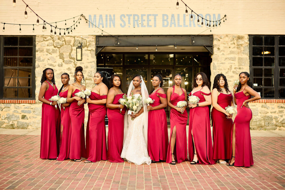 Bride and bridesmaids photo outside the venue