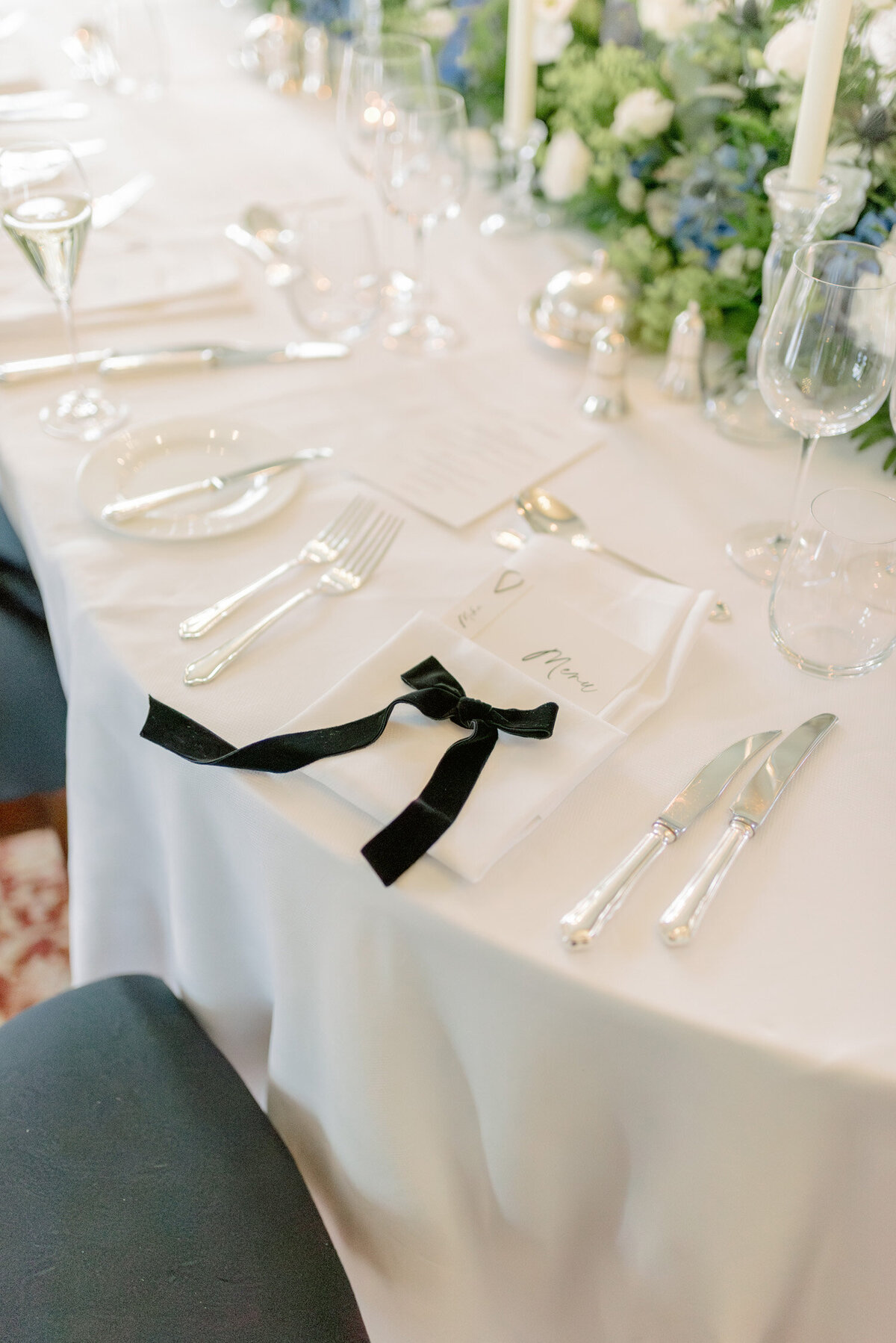 Velvet bow wedding table detail in Gleneagles Hotel. Image by award winning luxury wedding photographer Scotland, Jill Cherry Porter.