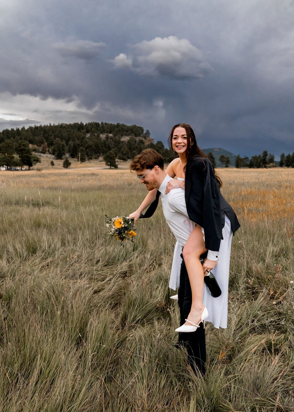 denver colorado wedding photographer - bride on groom's back
