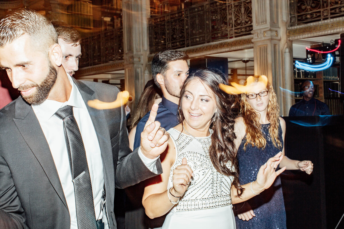 Bride and groom dancing at reception.