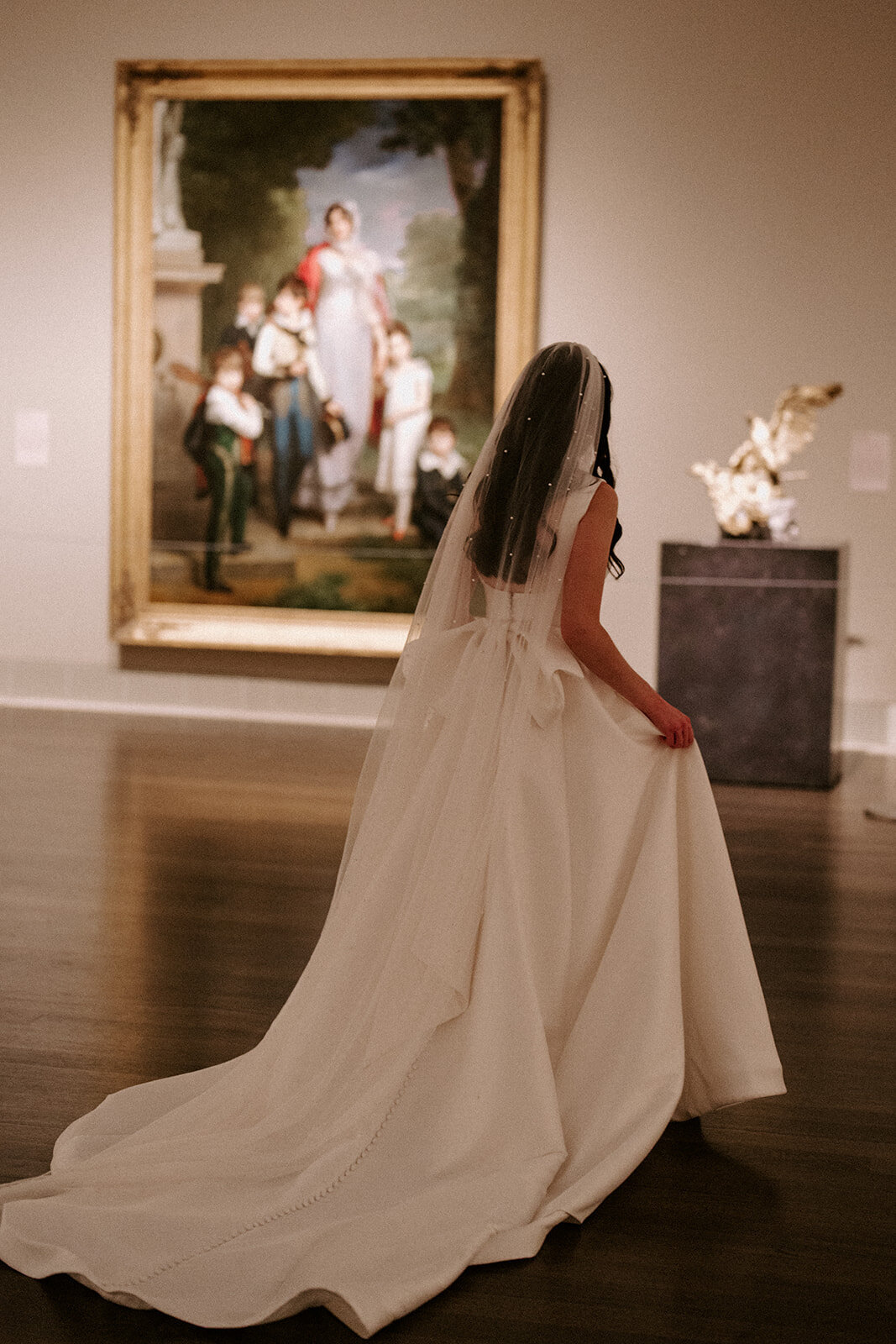 Bride in gown at museum of fine arts houston in texas