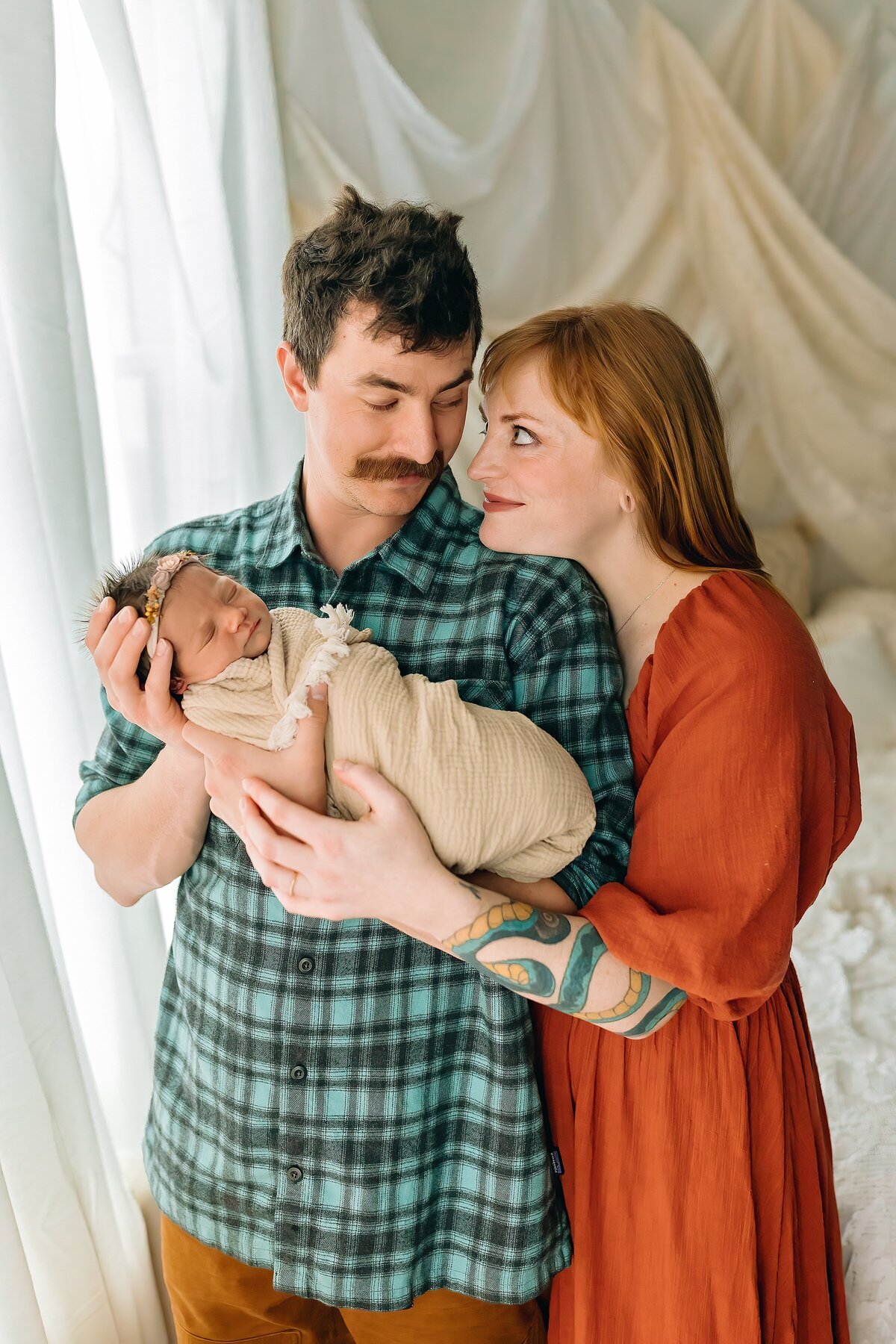 Mom and dad at newborn photography studio in Harrisonburg, VA