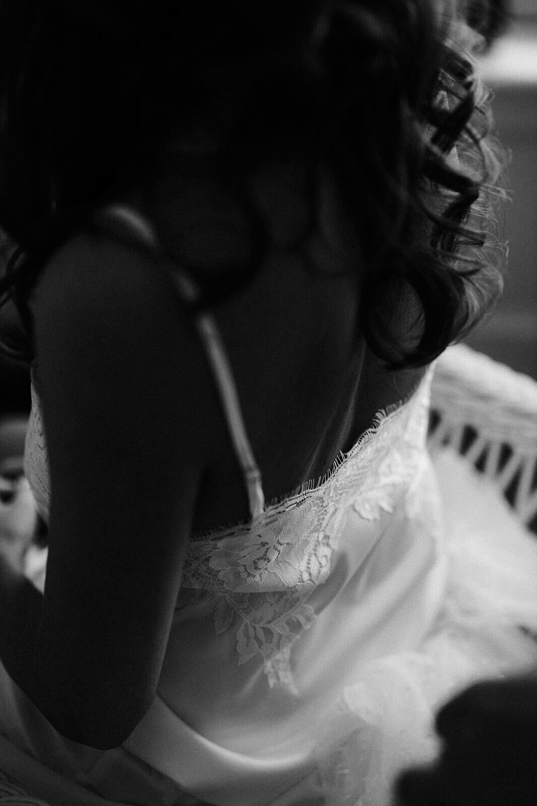 Black and white close-up shot of the bride's back in Cape Cod, MA.