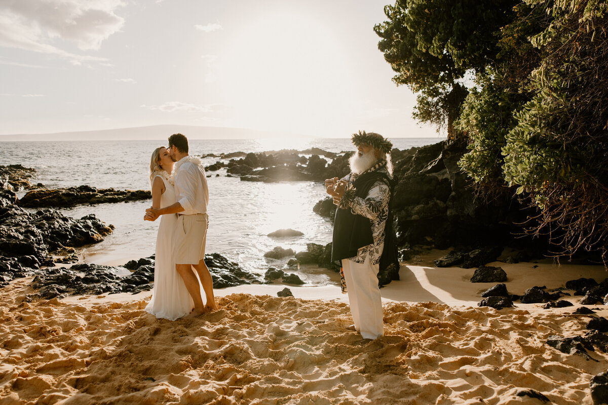 Maui Wedding Photographer captures bride and groom dancing on beach