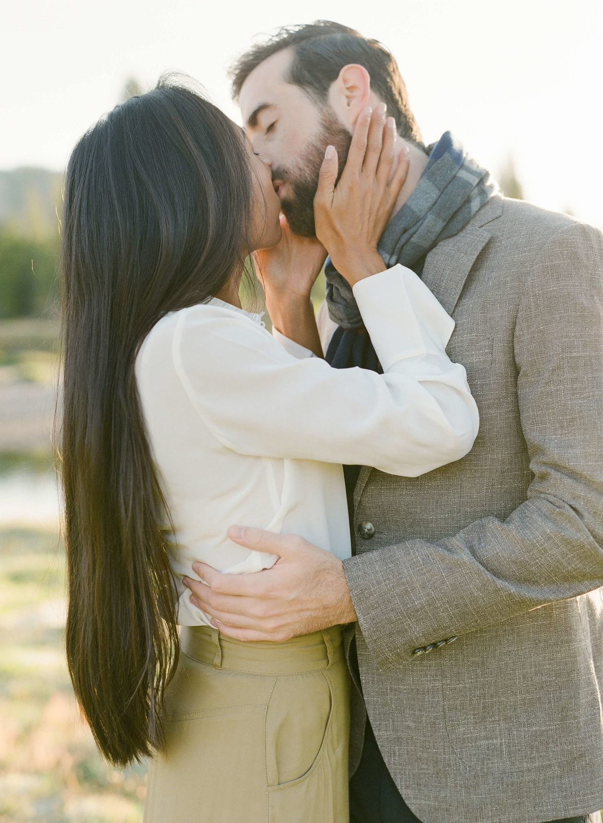 25-KTMerry-engagement-photography-couple-kissing-Yosemite
