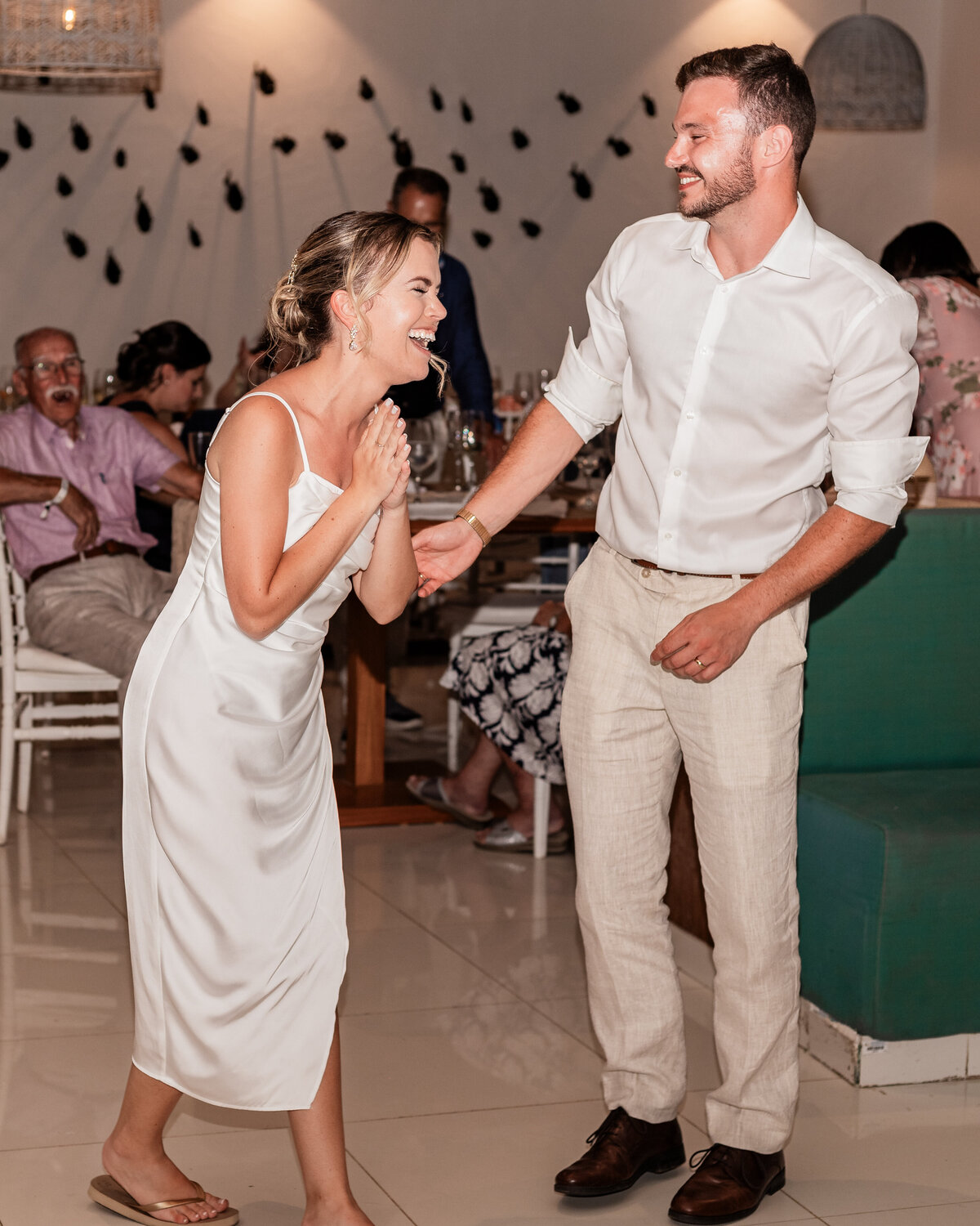 bride-laughing-at-reception