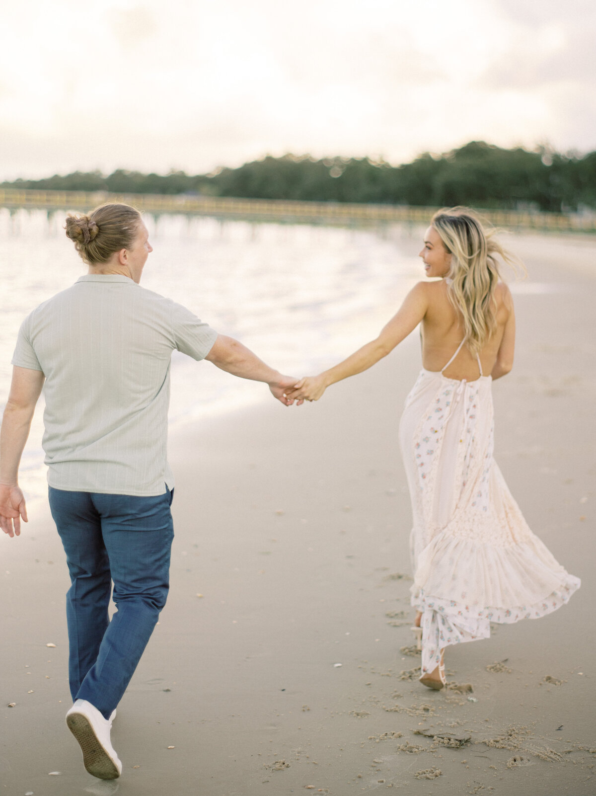 Engagement photos on the beach in Charleston. Photography by Philip Casey.