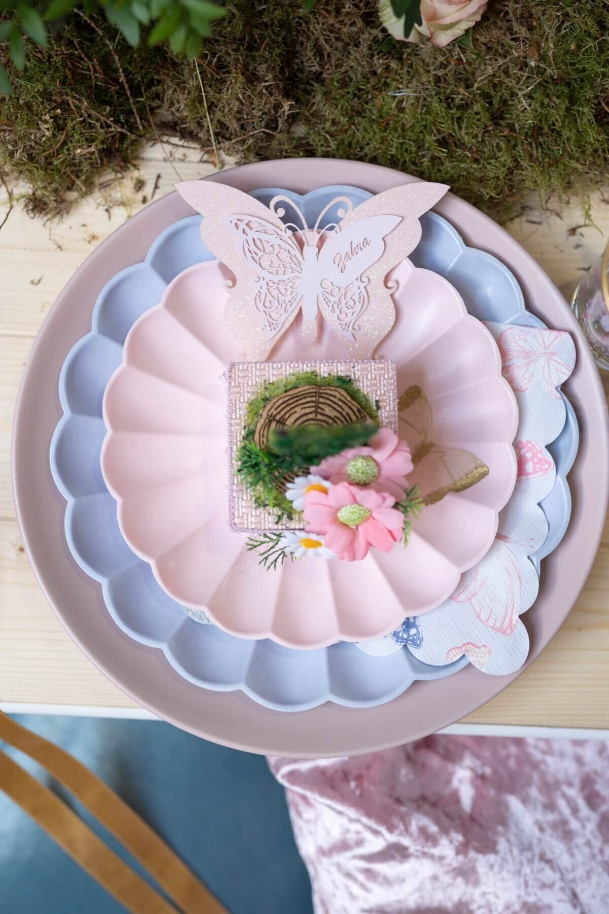 Pink and Blue flower plates with butterfly table place setting and small basket favour