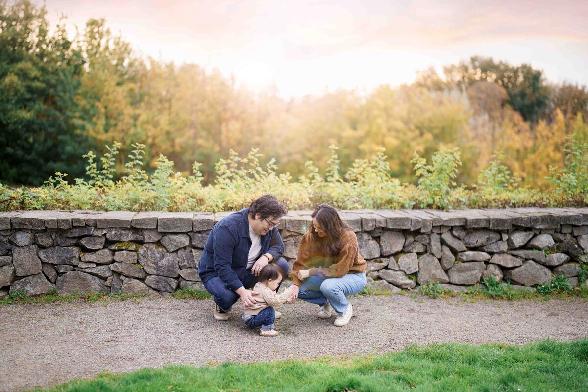 Seattle Family Photographer Outdoors Discovery Park Seattle Toddler and Parents with Sunset Lana Stewart Studios
