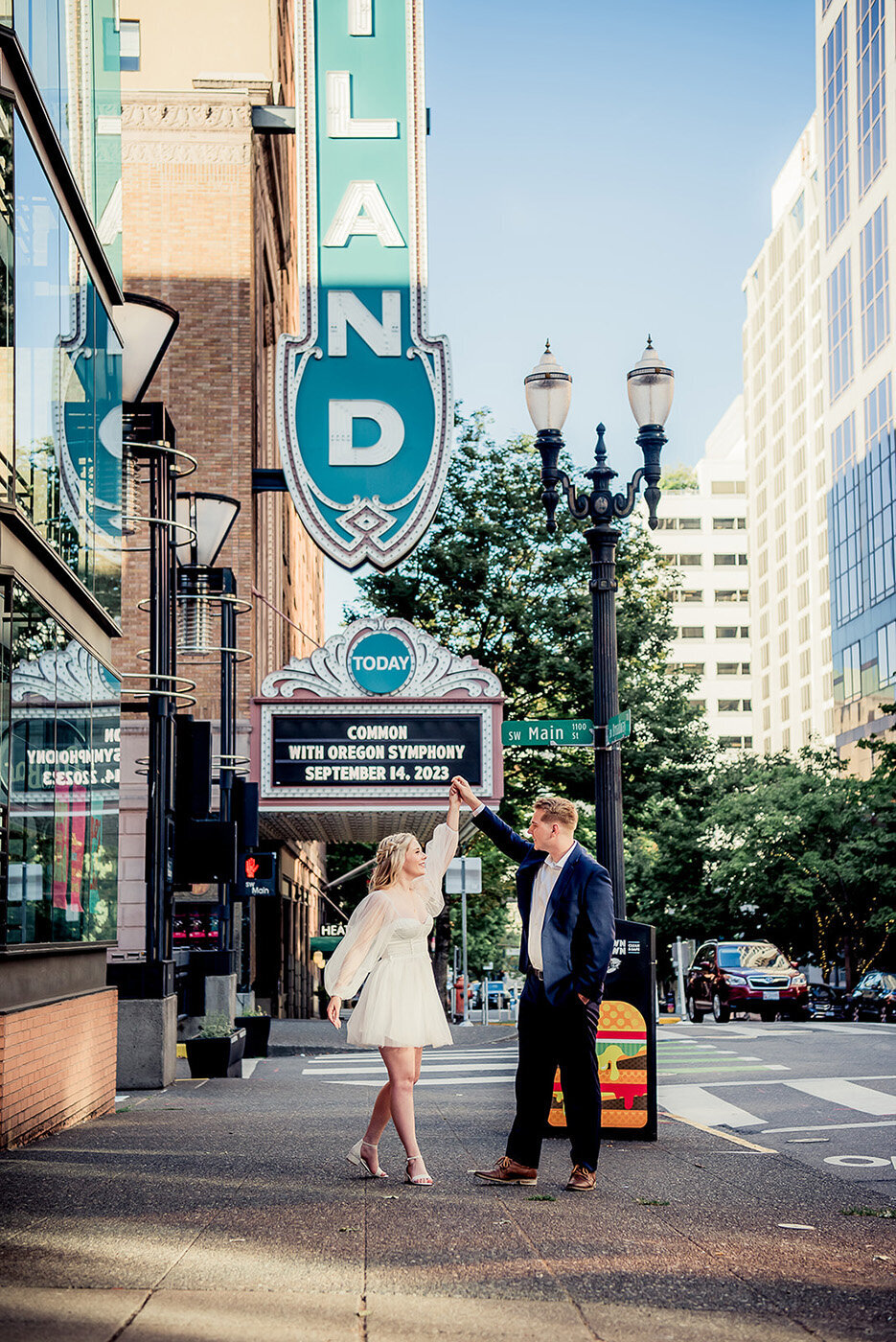 couple with portland sign