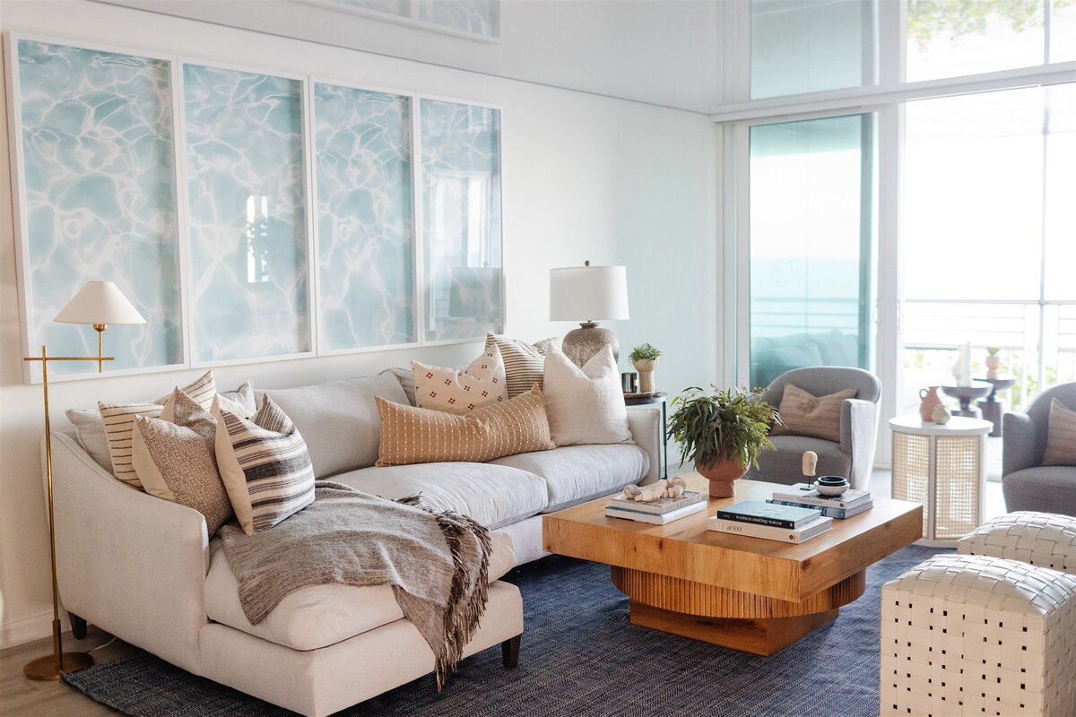 Coastal styled living room with ocean wall decor