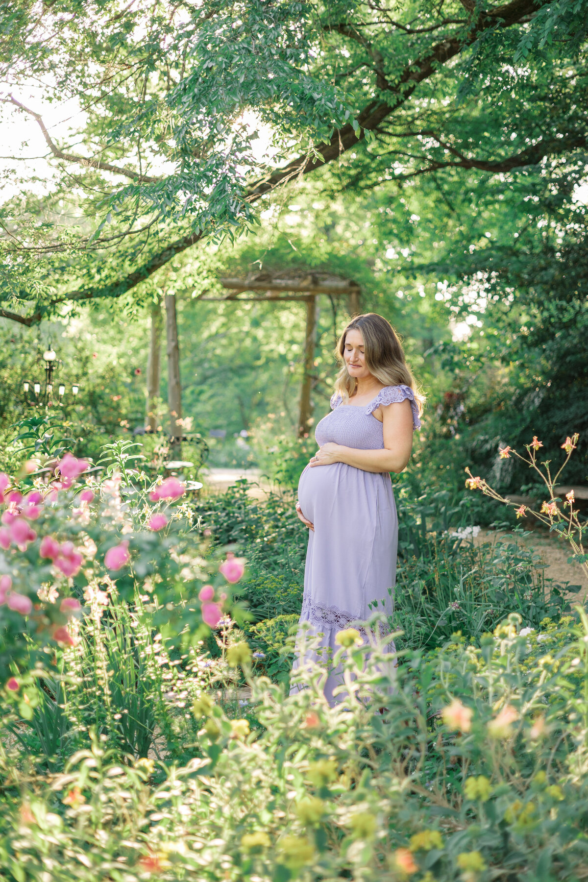 pregnant mom in beautiful garden maternity session greenville, sc maternity photographer