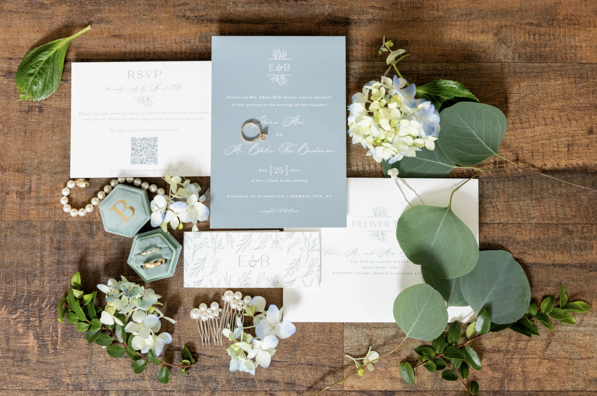 Spring wedding at WinMock at Kinderton, designed by Charming Carolina — invitation suite with pearl strands, monogram details, and floral styling.