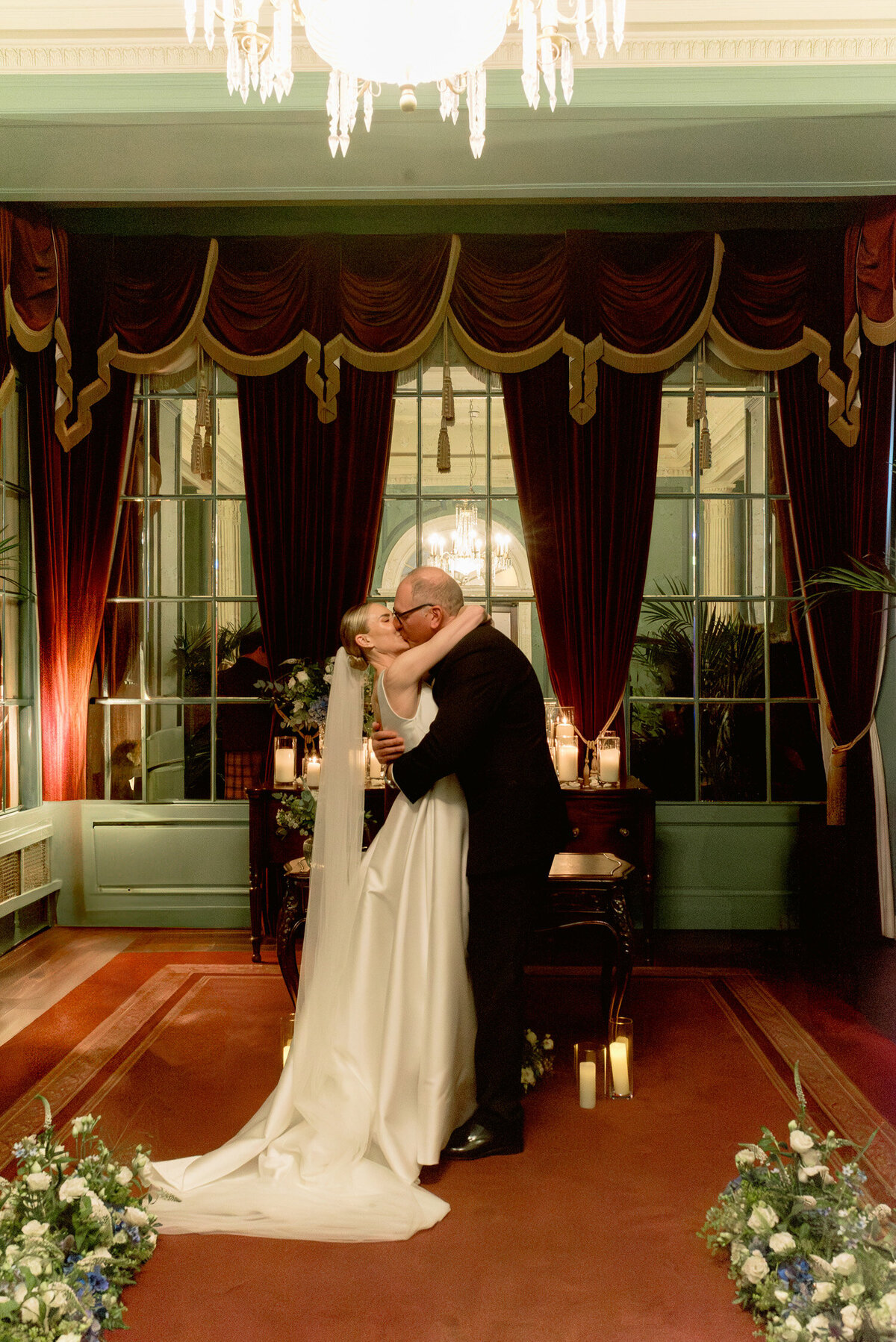 Bride and Groom first kiss during their Gleneagles wedding ceremony.  Image by Scotland wedding photographer, Jill Cherry Porter.