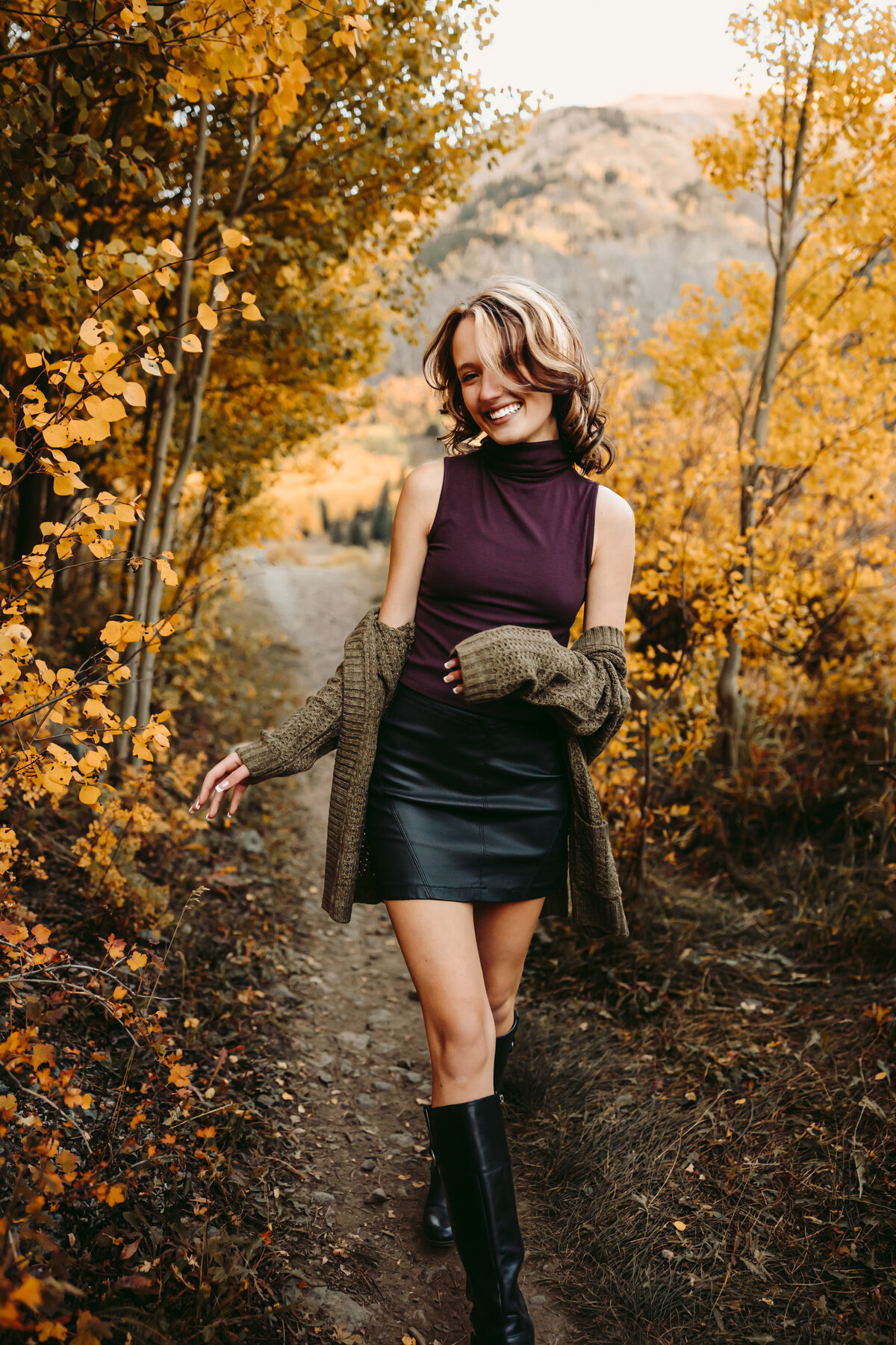 Jaleigh explores golden foliage in Ouray Colorado.