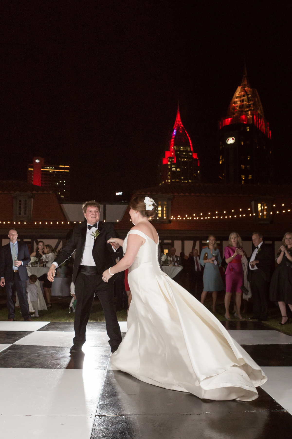 The new couple has their first dance at Ft. Conde in Mobile, Alabama.