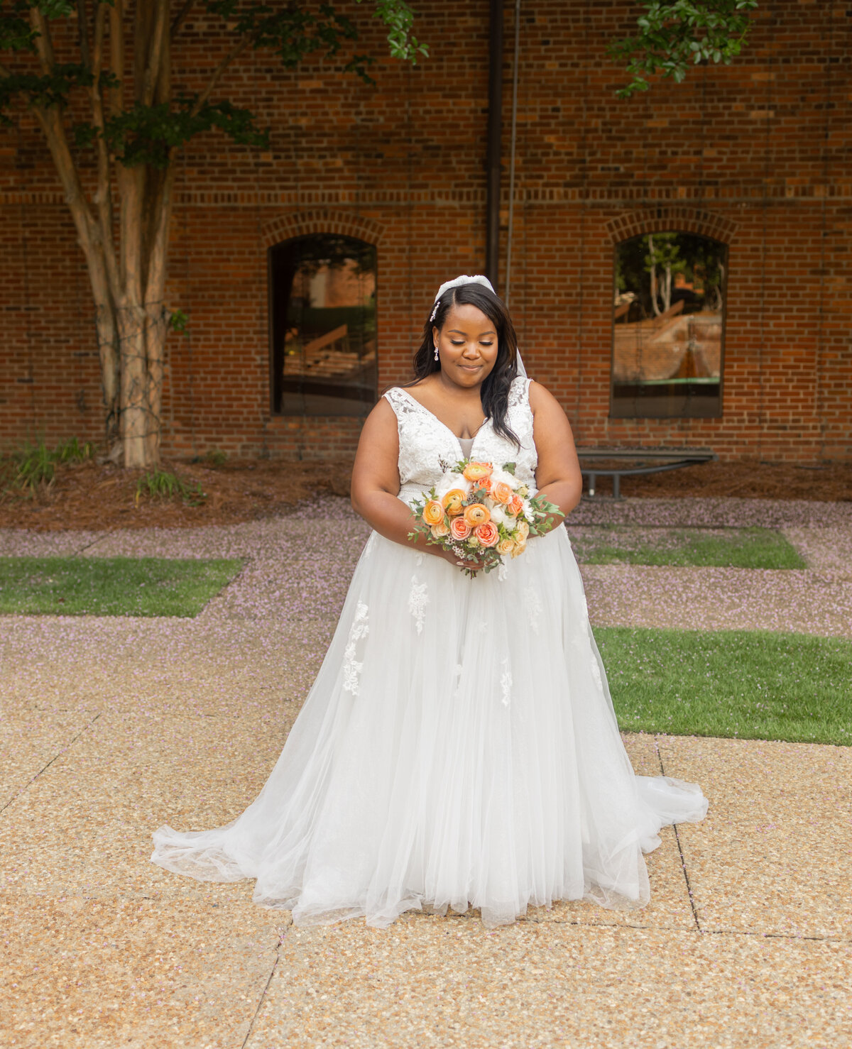 black bride wearing lace dress at Columbus Trade and Convention Center by Columbus Georgia wedding photographer Amanda Richardson Photography
