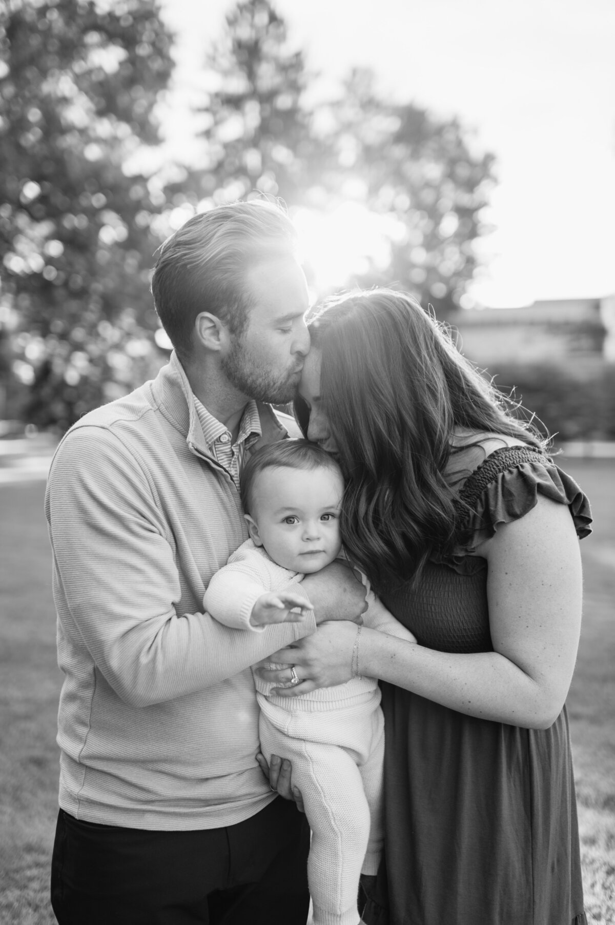 Black and white family hug portrait South Bend