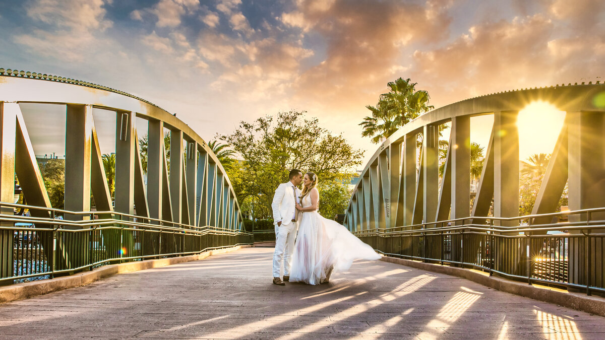 Couple taking photos at Disney Springs after their Paddlefish Wedding
