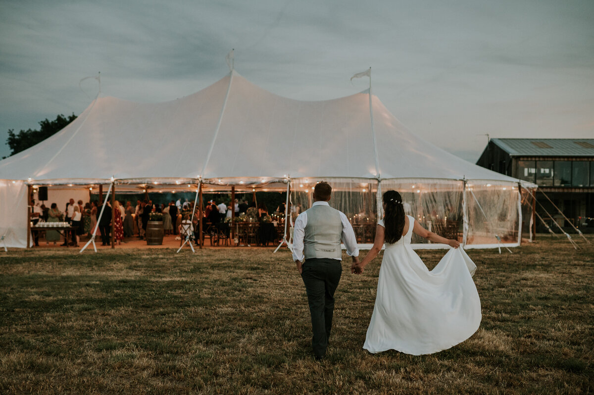 Tent wedding reception at sunset