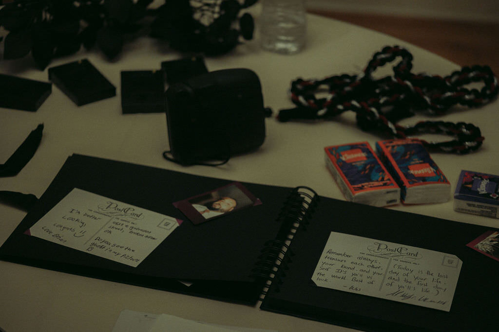 Rope, tissues, and a guest book laying out on a table.