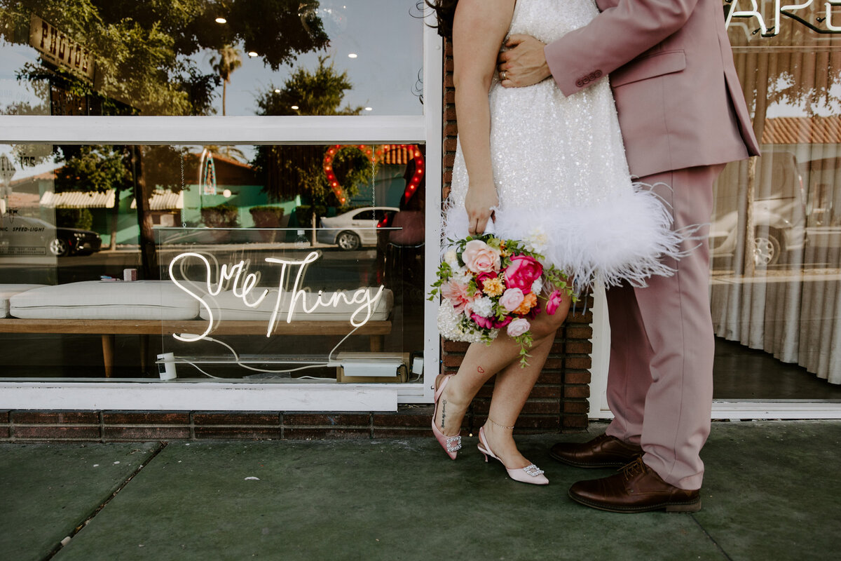 Close up of a couple's legs at the Sure Thing Wedding chapel.