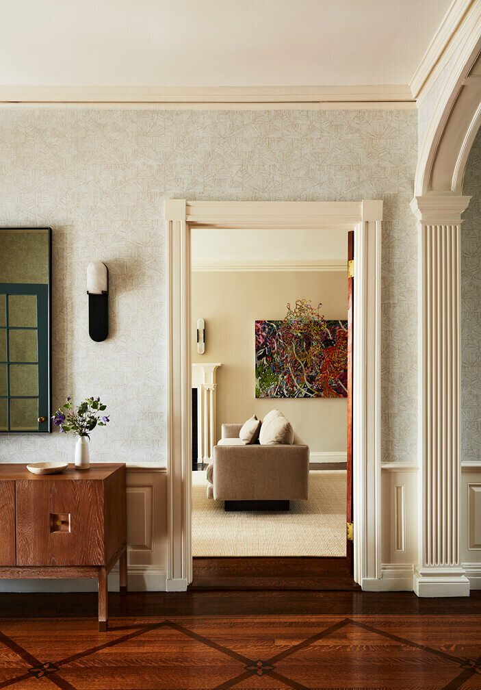 Historic home design in Boston blends classic architecture with modern natural oak furniture, creating a timeless and balanced interior.