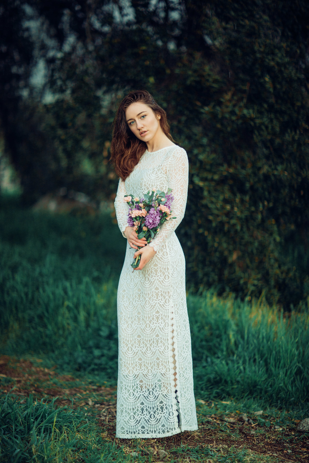 Portrait Photo Of Young Woman In White Dress Holding Flowers Los Angeles