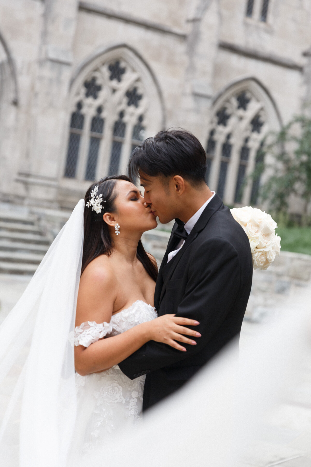stunning bride and groom kiss church wedding best photographer Salamander Resort _ Spa