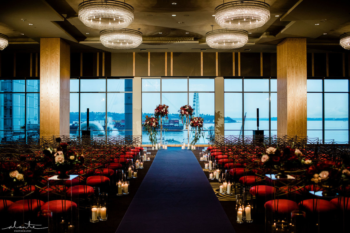 Four Seasons Seattle ballroom wedding in the winter with red chairs and red flowers