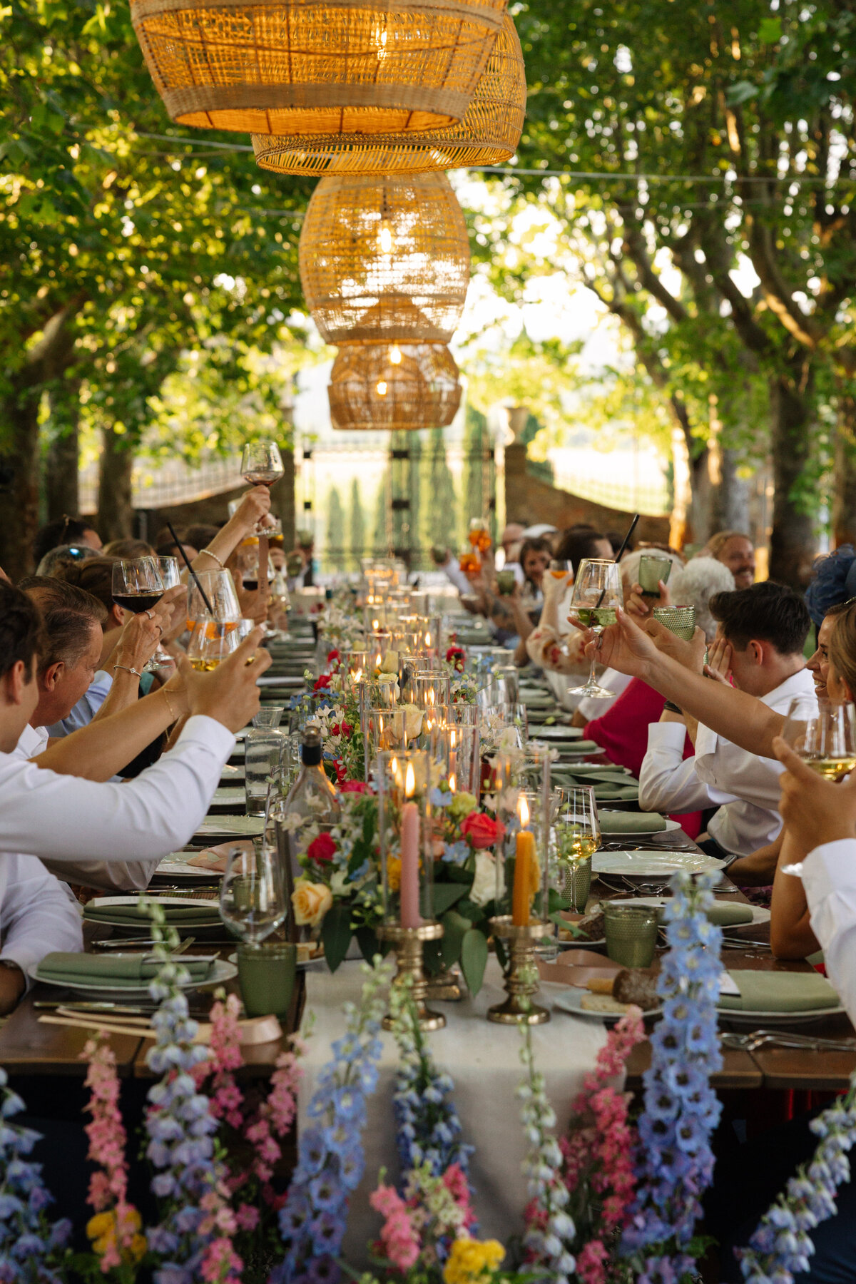 wedding reception guests toasting