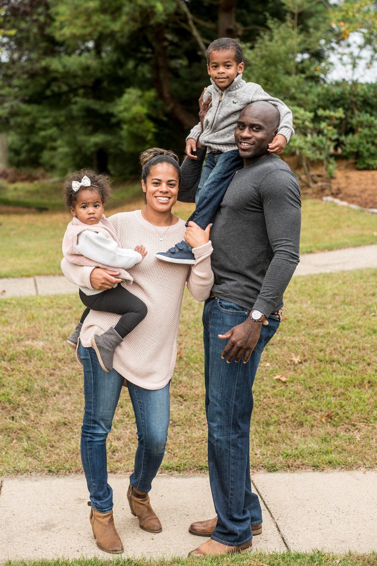 a Black family photography session for a family of four