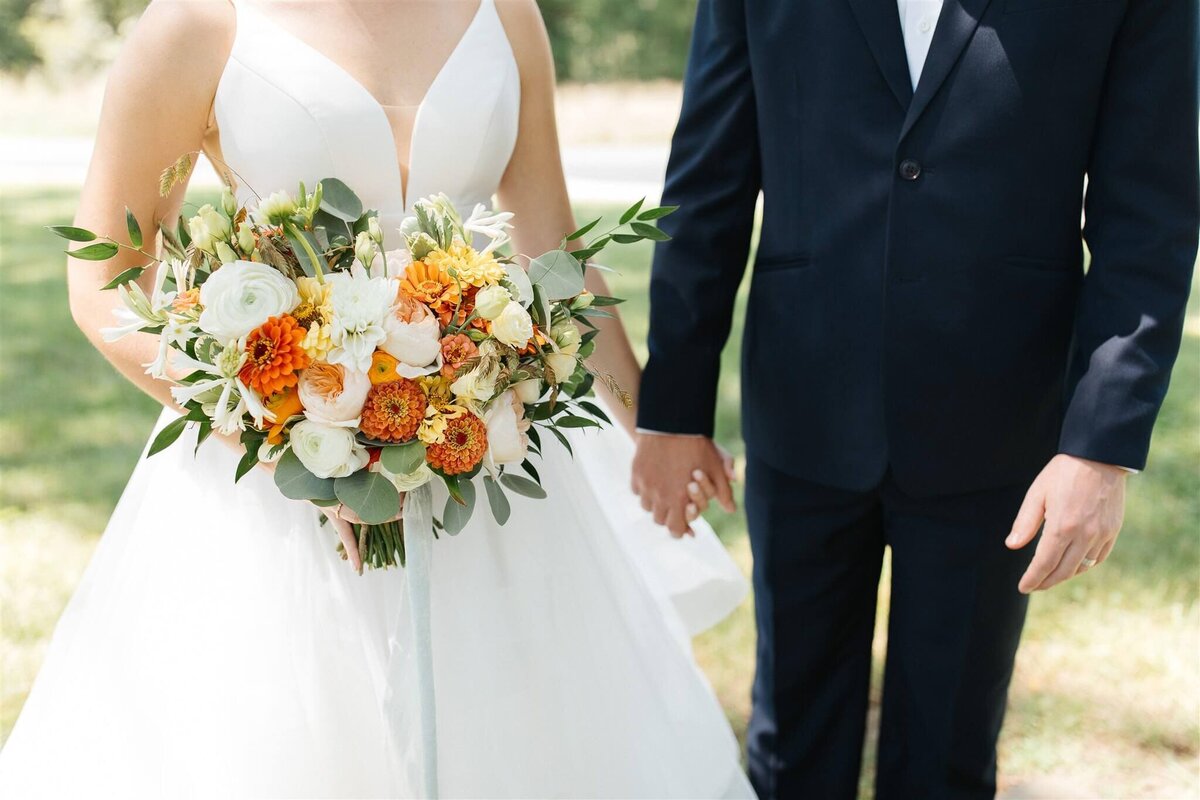 Kalynne Miller Wedding - bride holding groom's hand