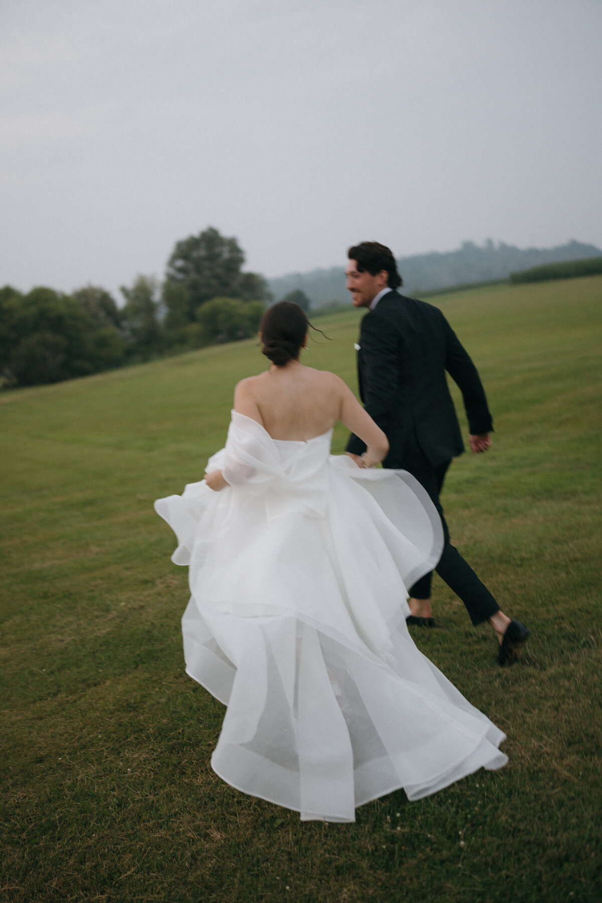 Stunning editorial wedding photography showcasing fashion photography excellence at Connecticut's premier luxury destination venue. Lauren Alatriste captures
  sophisticated composition with authentic emotional storytelling in destination wedding documentation.