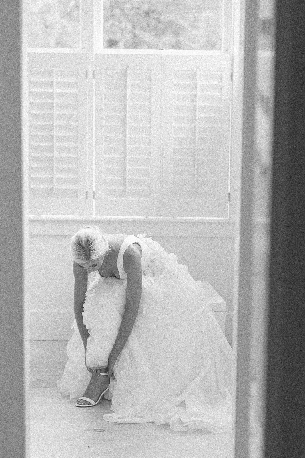 bride-getting-ready-shoes