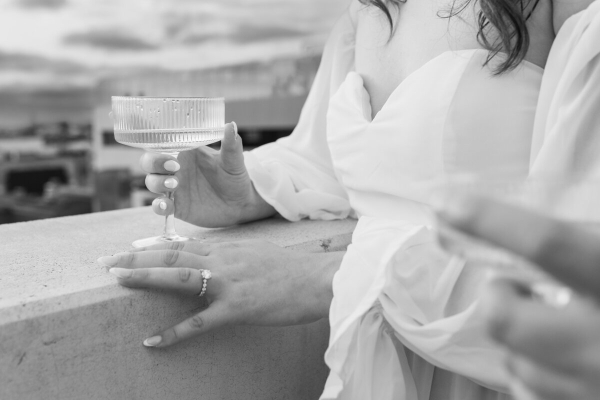 Rooftop Champagne engagement photography by Savvy Shoots photography