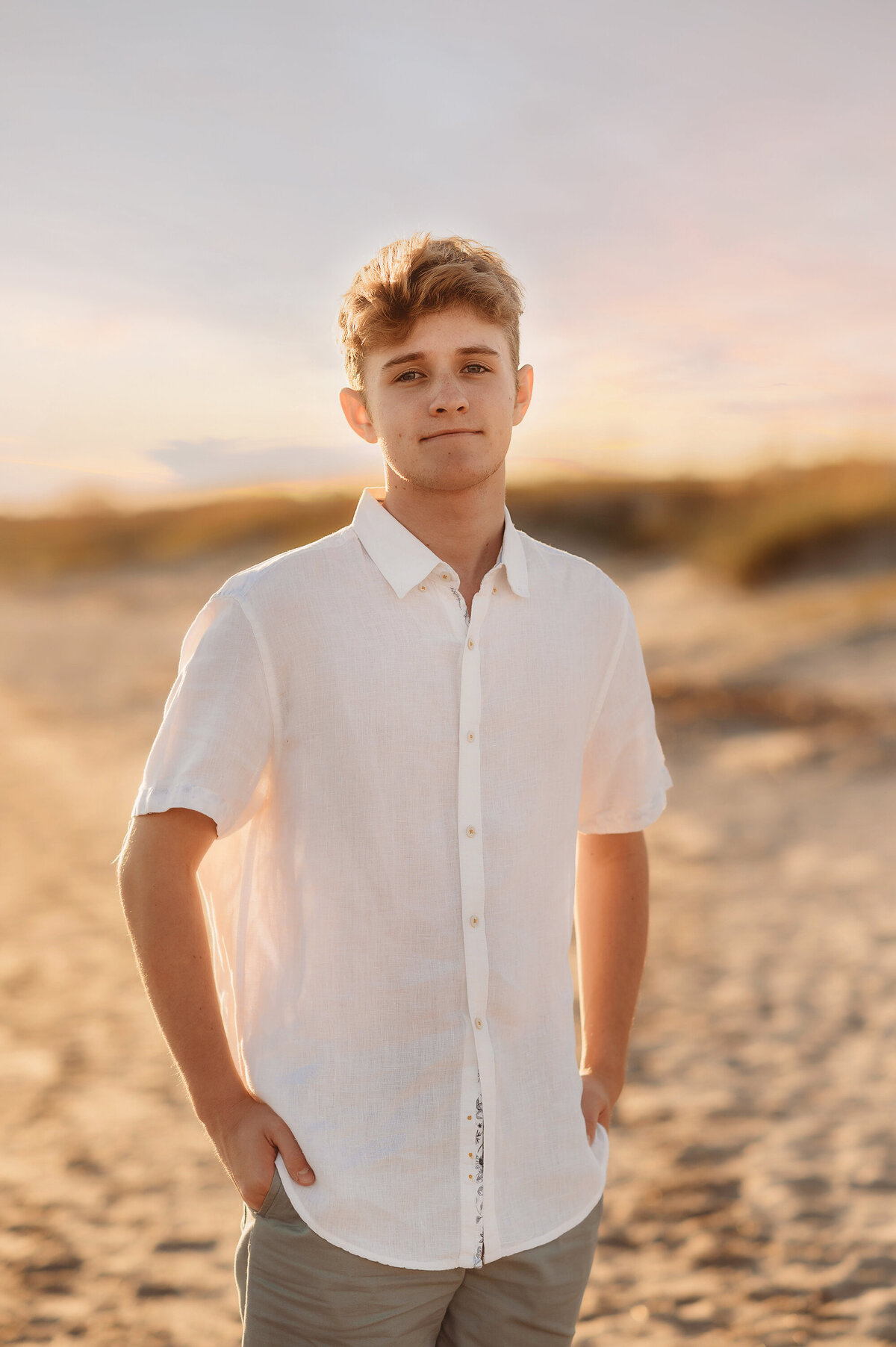 Boy glances at the camera during Beach Photos in Isle of Palms.